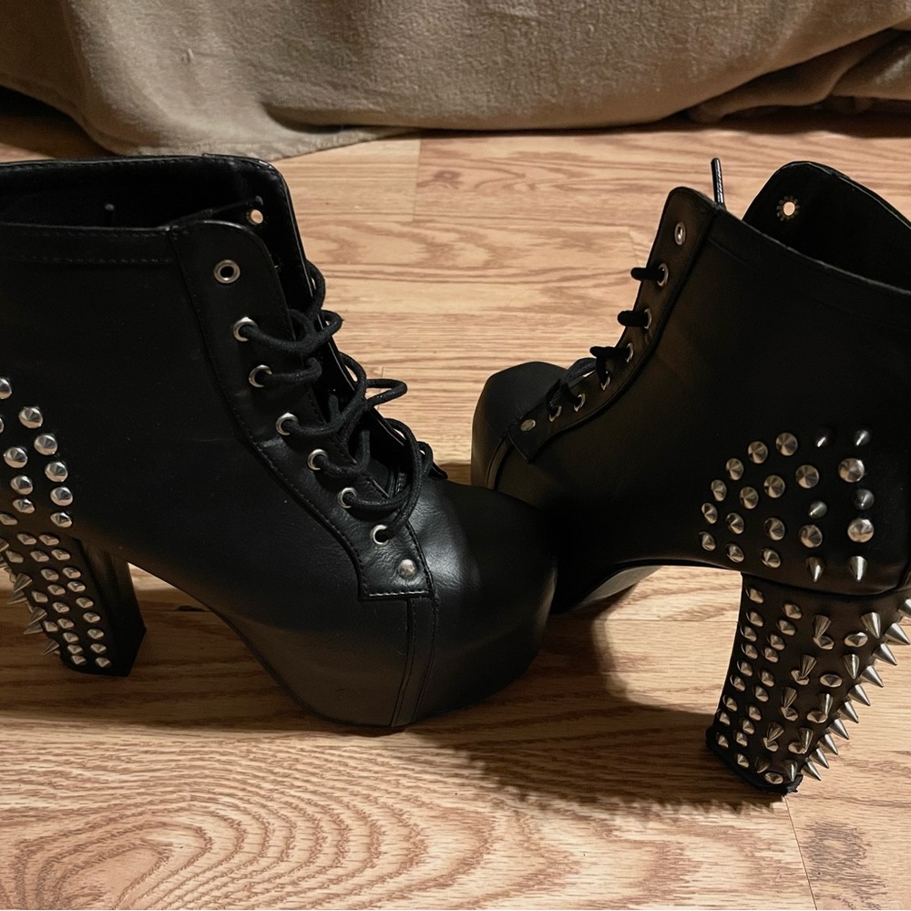 Black heeled spike boots. US women’s size 6.5